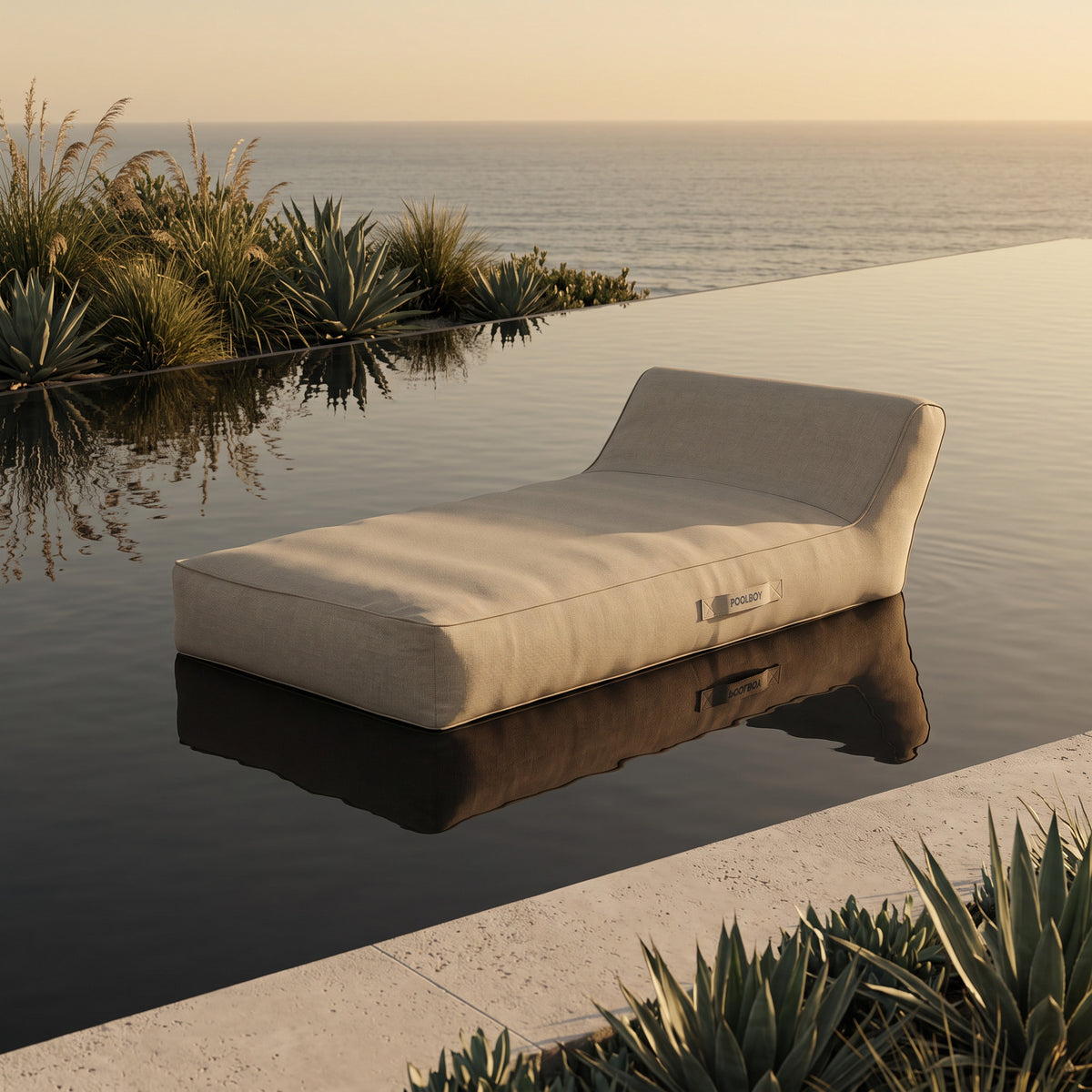 Poolboy Floata-Long in Natural beige on the water.
