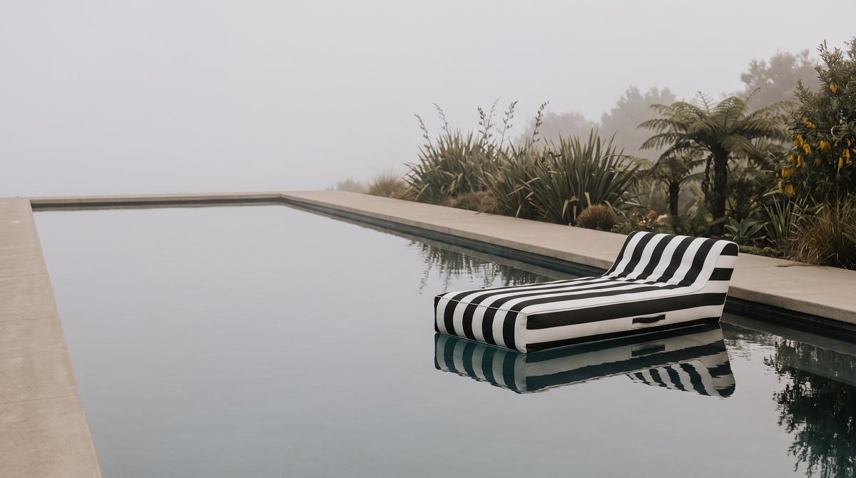 Poolboy Floata-Long on a still New Zealand pool in morning mist